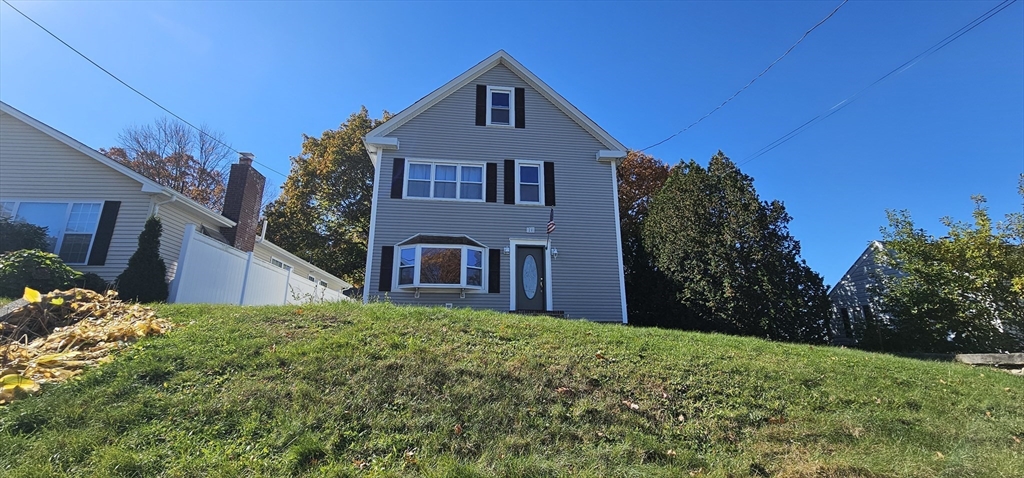 20 Park Avenue, Unit 1 Webster, MA 01570 - Photo 17 of 20 a front view of a house with a yard