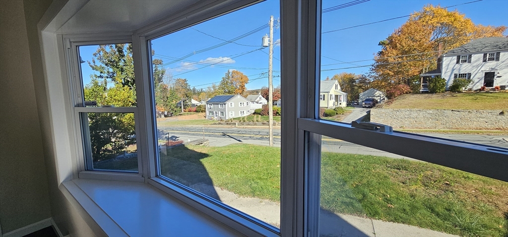 20 Park Avenue, Unit 1 Webster, MA 01570 - Photo 7 of 20 a view of a floor to ceiling window and a living room