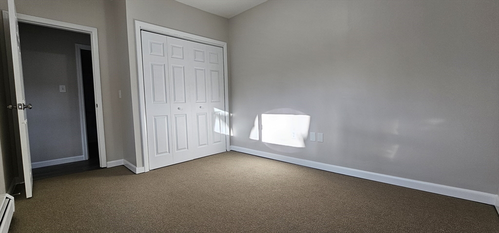 20 Park Avenue, Unit 1 Webster, MA 01570 - Photo 10 of 20 an empty room with a window
