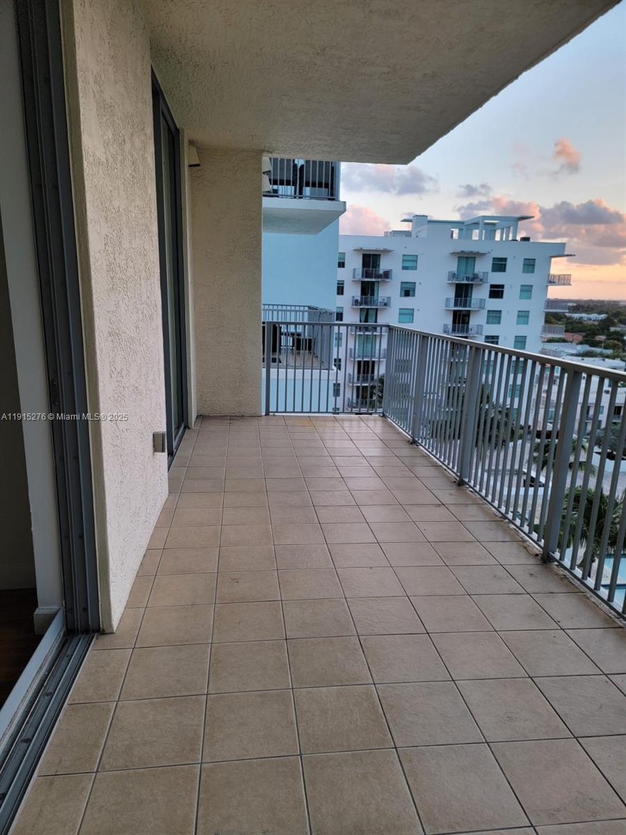 140 South Dixie Highway, Unit 908 Hollywood, FL 33020 - Photo 10 of 28 a view of a terrace with wooden floor