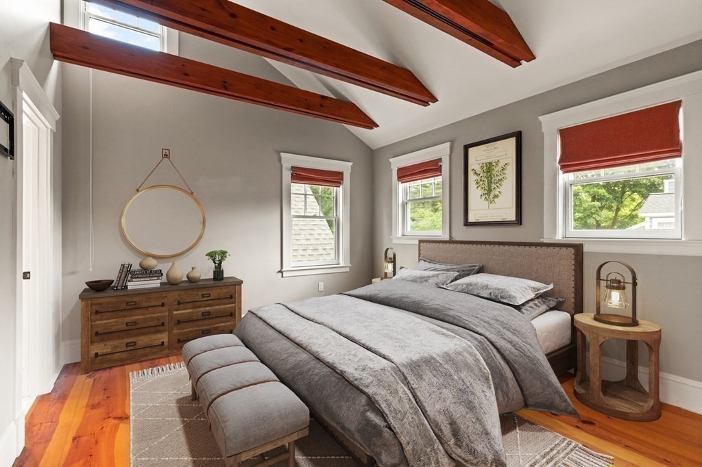 16 Anthony Road Bedford, MA 01730 - Photo 13 of 19 a bedroom with a bed and window with lamp