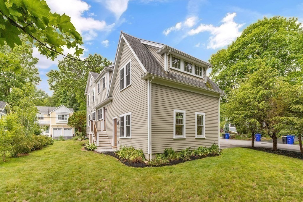 16 Anthony Road Bedford, MA 01730 - Photo 17 of 19 a view of a house with a yard