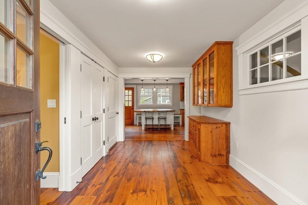 16 Anthony Road Bedford, MA 01730 - Photo 3 of 19 a living room with furniture and a table