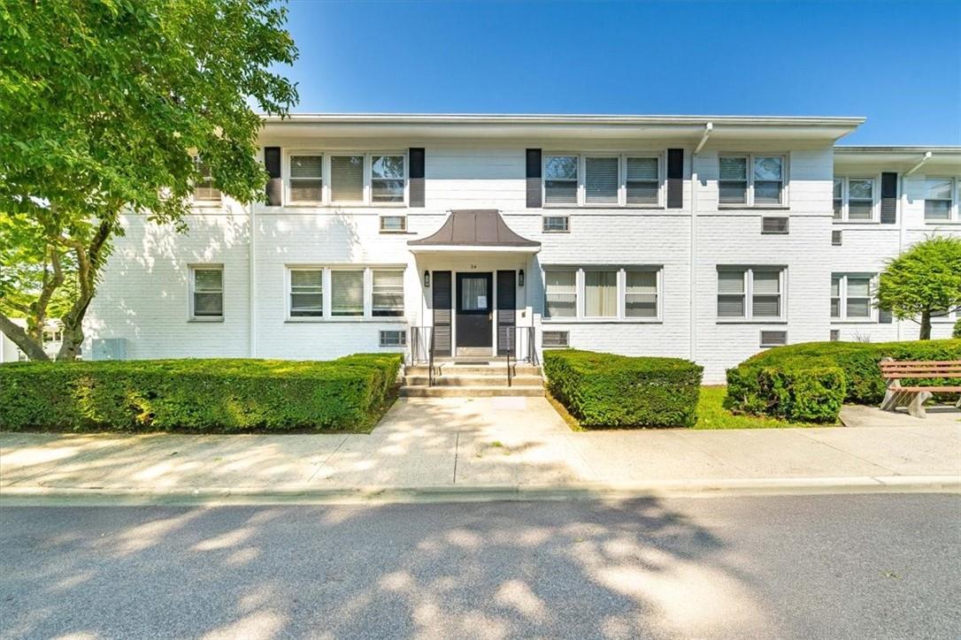 24 North Ridge Street, Unit B Port Chester, NY 10573 - Photo 1 of 1 a front view of a house with a garden