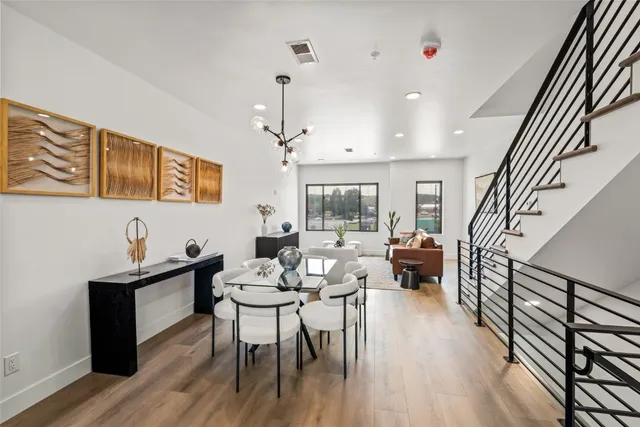 a kitchen with stainless steel appliances a sink a stove cabinets counter space and cabinets