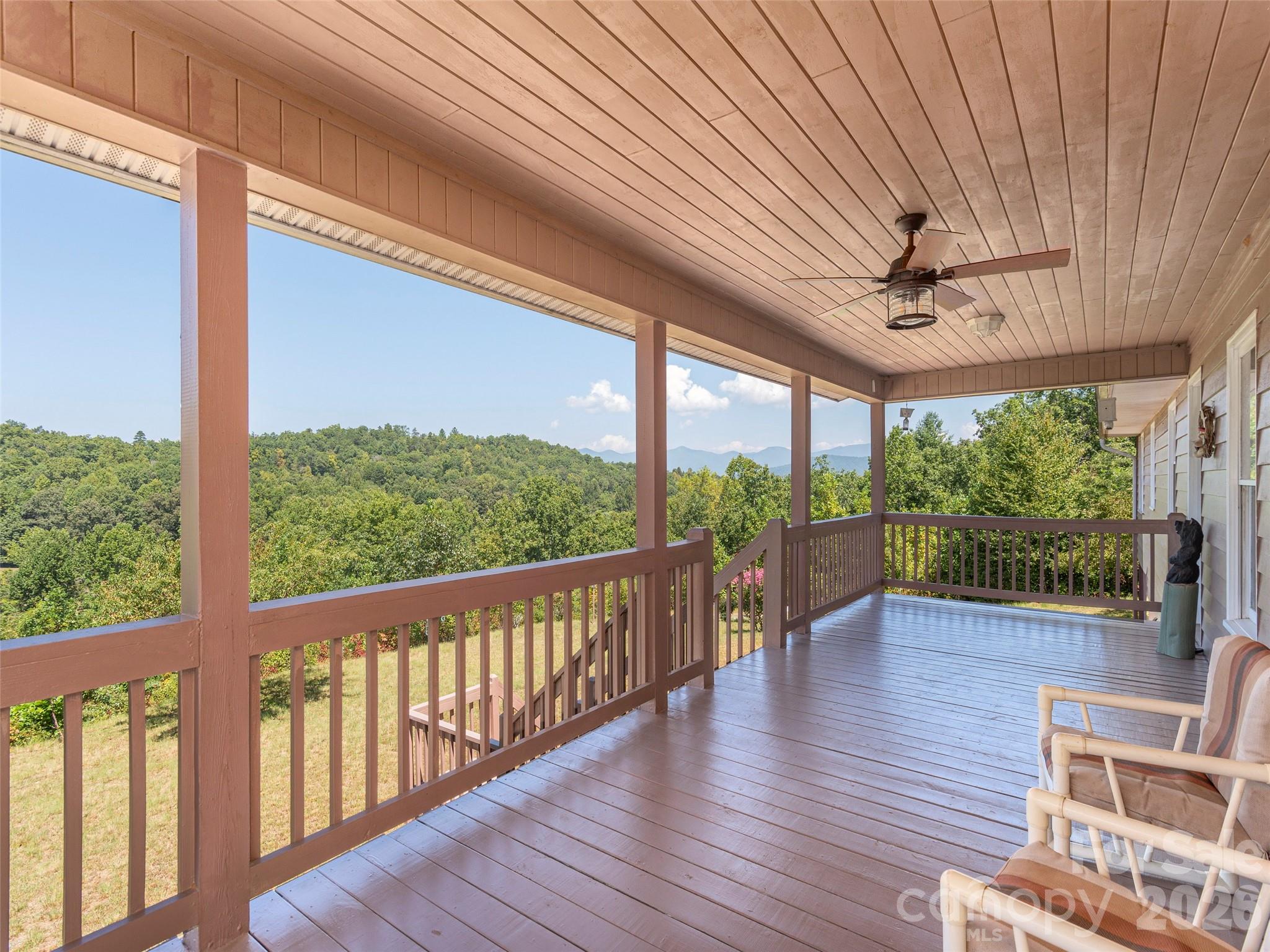1120 Jacobs Branch Road Franklin, NC 28734 - Photo 7 of 36 a view of a porch with wooden floor and outdoor space