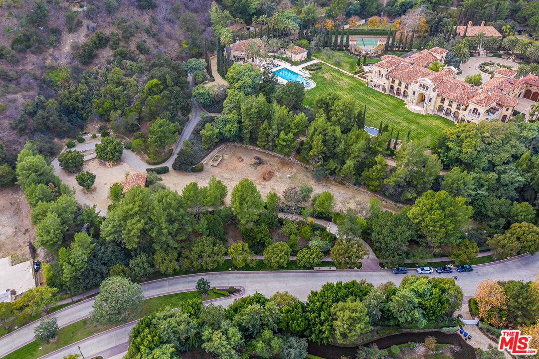 64 Beverly Park Beverly Hills, CA 90210 - Photo 6 of 7 an aerial view of a houses with outdoor space and street view