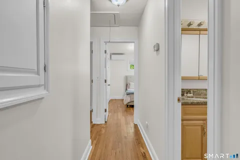 a view of a bathroom from the hallway