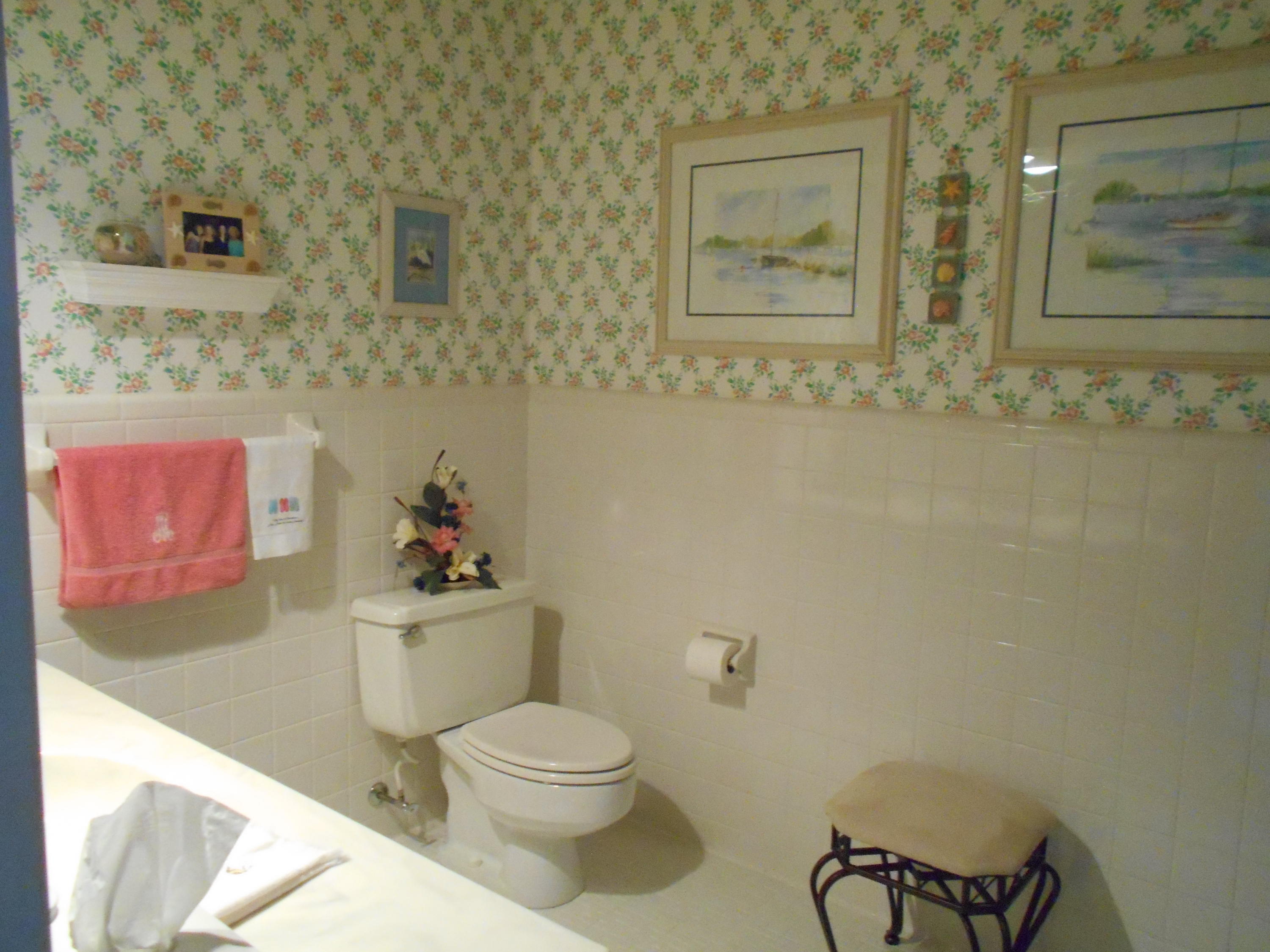 949 Highland Lake Road Union Hall, VA 24176 - Photo 22 of 29 a bathroom with a toilet a sink and a shower