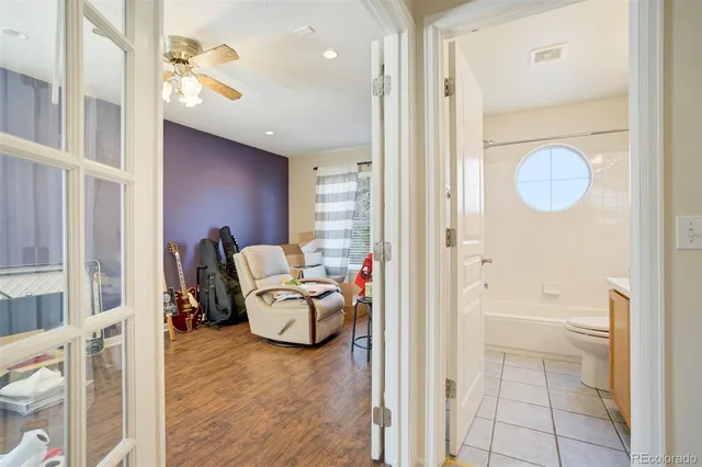 a view of living room with furniture and a window