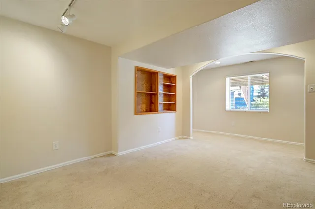 an empty room with windows