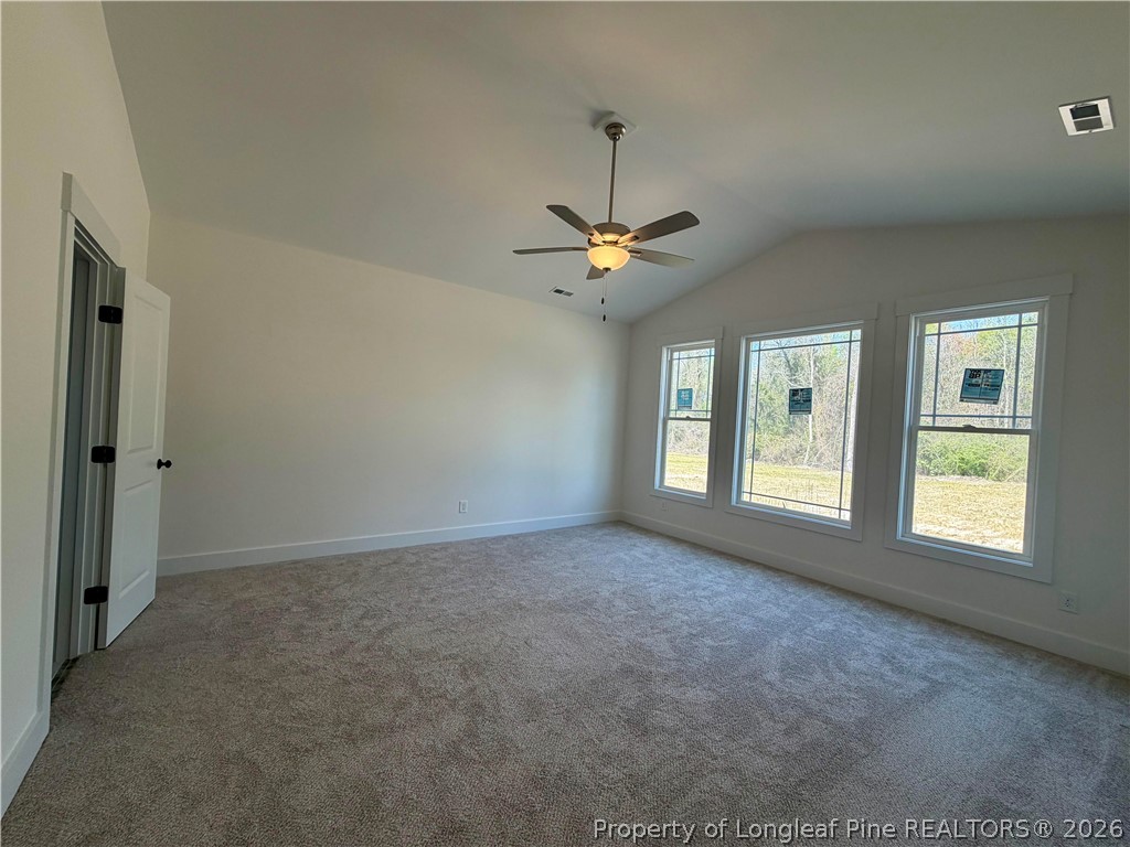 1788 Alderman Mill Road Dunn, NC 28334 - Photo 9 of 14 a view of an empty room with a window
