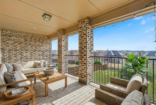 a balcony with furniture
