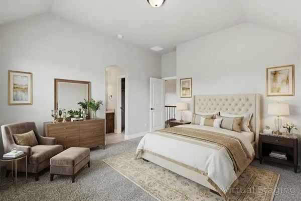 a bedroom with a bed and a couch