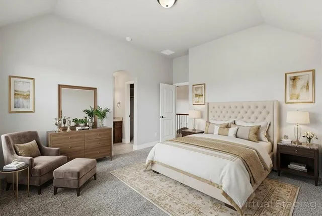 a bedroom with a bed and a couch