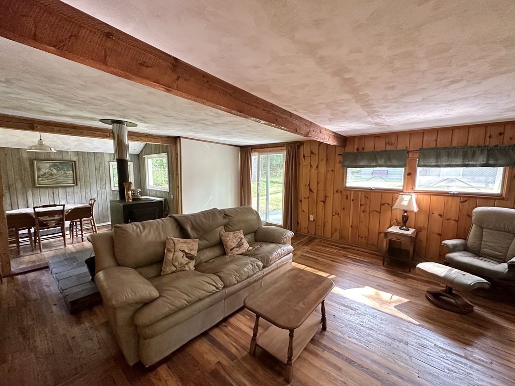 100 Aberdeen Road Goshen, MA 01096 - Photo 15 of 27 a living room with furniture and a wooden floor