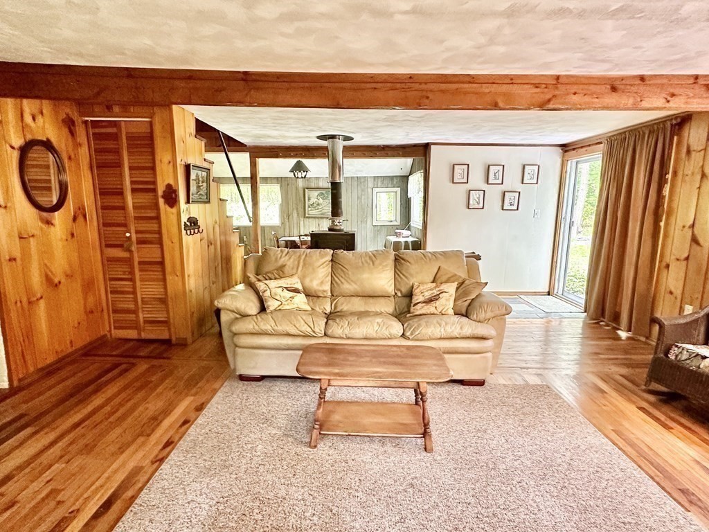 100 Aberdeen Road Goshen, MA 01096 - Photo 16 of 27 a living room with furniture and a flat screen tv