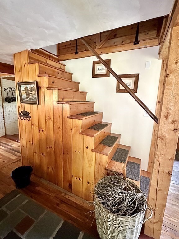 100 Aberdeen Road Goshen, MA 01096 - Photo 18 of 27 a view of a balcony with wooden floor and iron stairs
