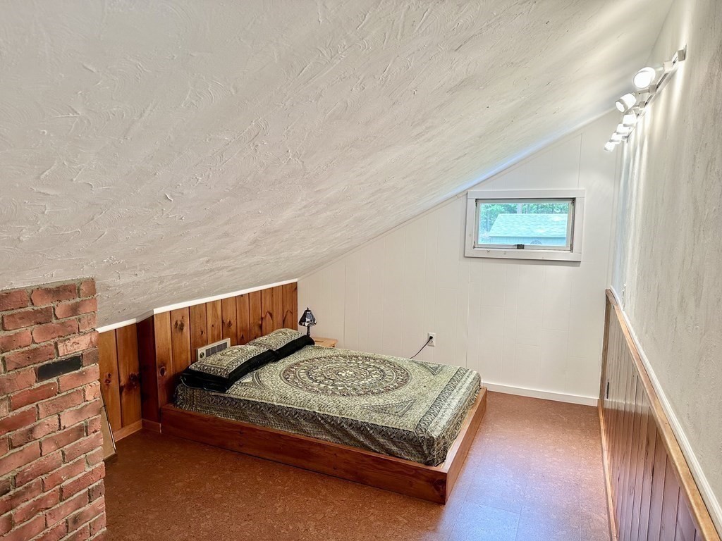 100 Aberdeen Road Goshen, MA 01096 - Photo 20 of 27 a bedroom with a bed and a night stand