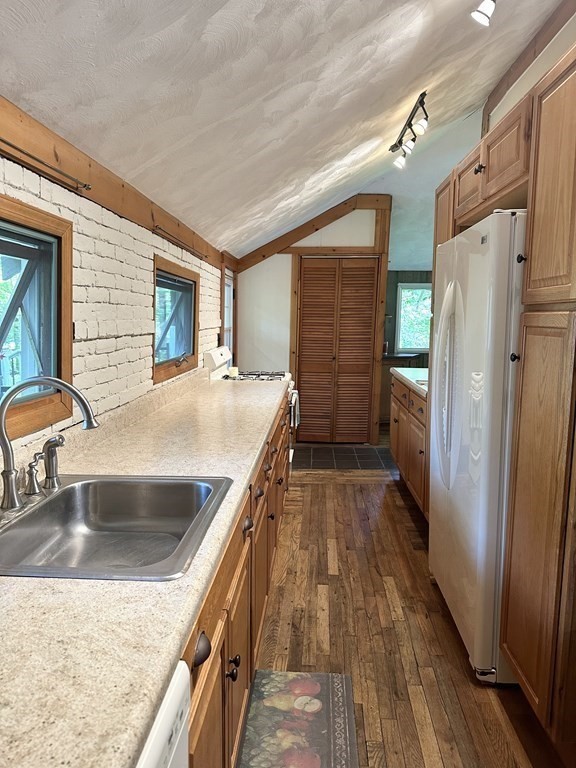 100 Aberdeen Road Goshen, MA 01096 - Photo 10 of 27 a kitchen with kitchen island a counter top space a sink and stainless steel appliances