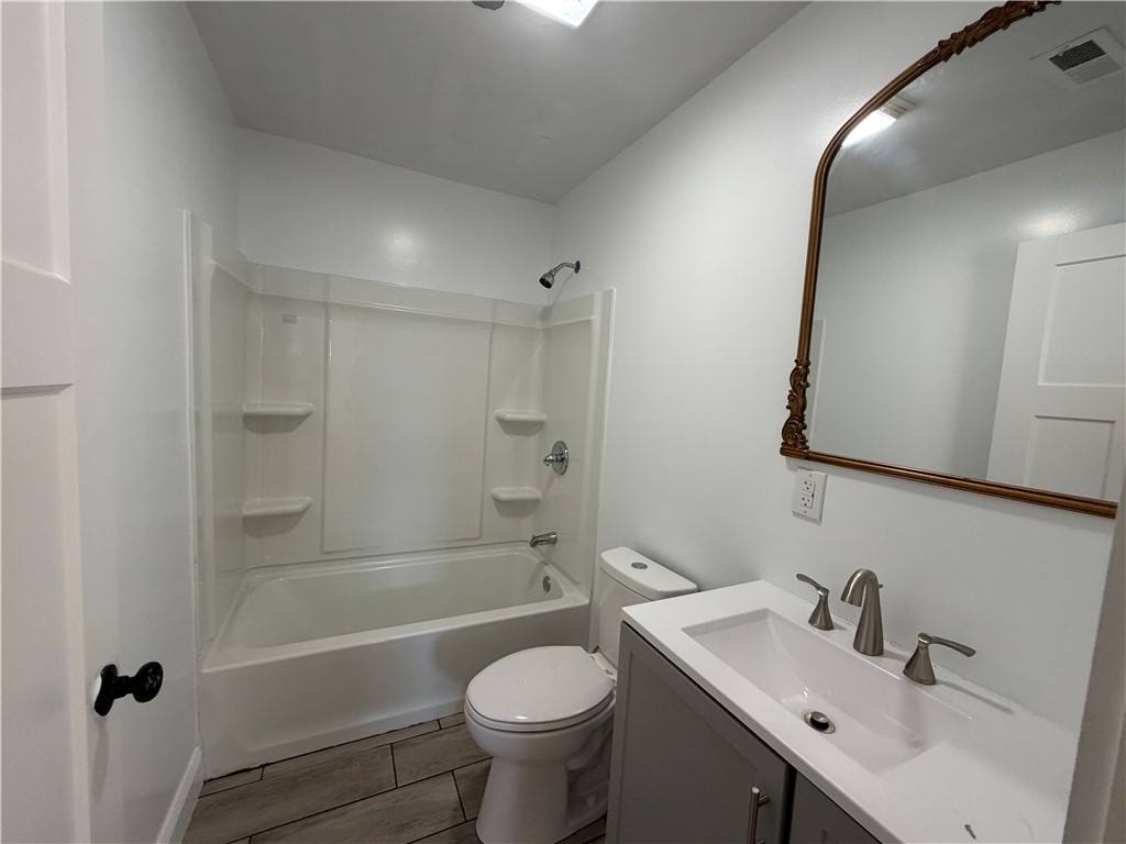 2910 Chambers Road Anderson, SC 29626 - Photo 8 of 16 Clean lines and classic finishes define this functional bathroom space featuring a combined tub and shower.