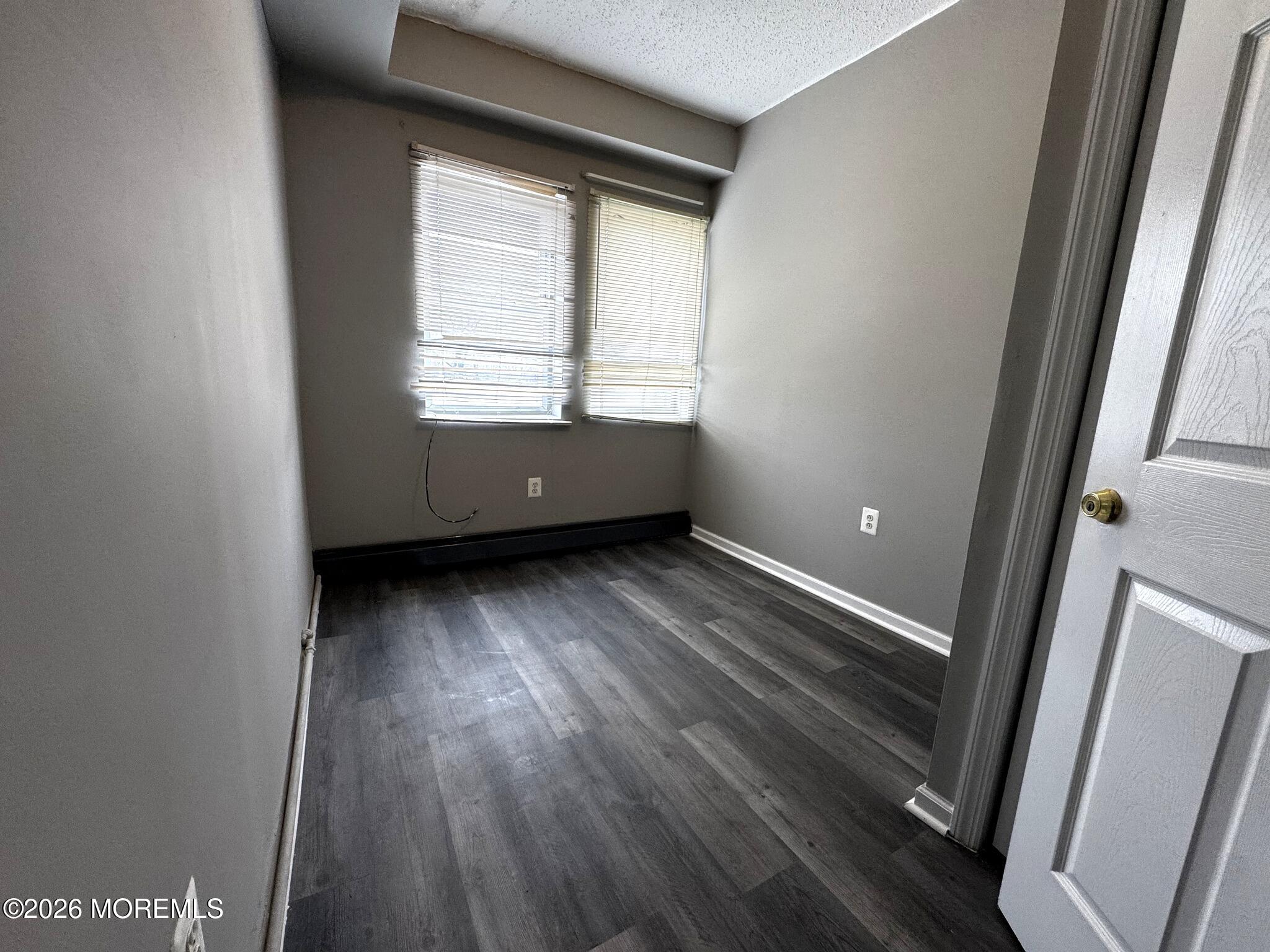 1830 East Riverside Drive Atlantic City, NJ 08401 - Photo 13 of 41 a view of room with window and hardwood floor