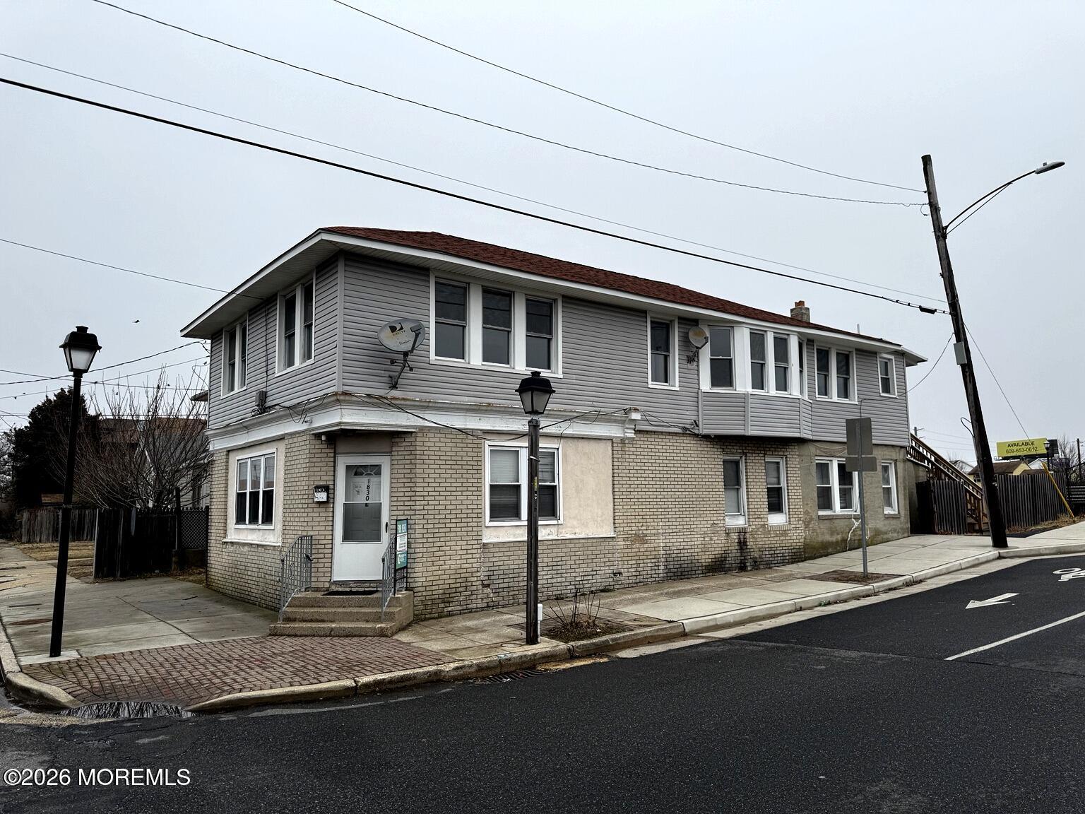 1830 East Riverside Drive Atlantic City, NJ 08401 - Photo 2 of 41 a front view of a house with a street