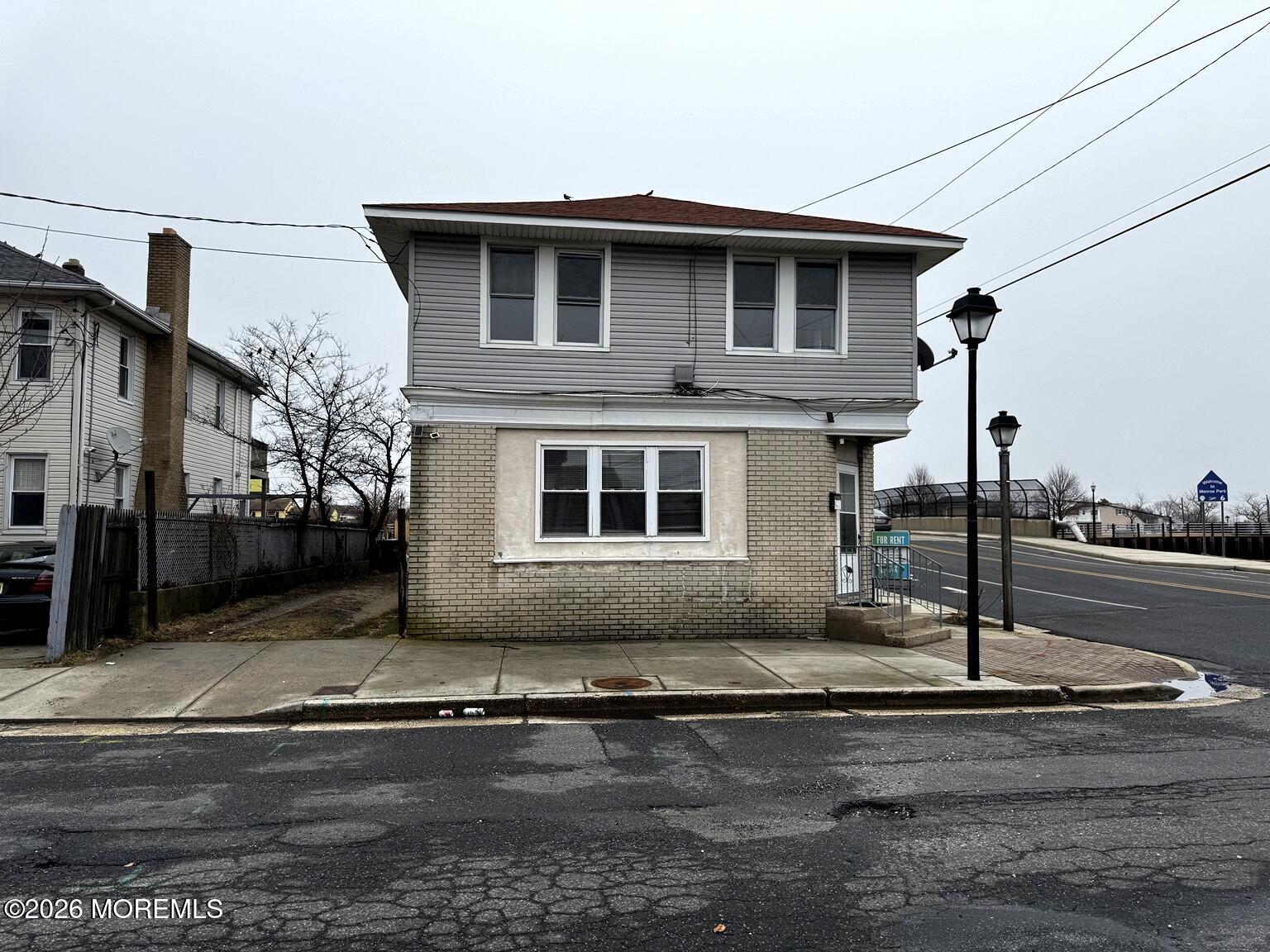 1830 East Riverside Drive Atlantic City, NJ 08401 - Photo 3 of 41 a front view of a house with street