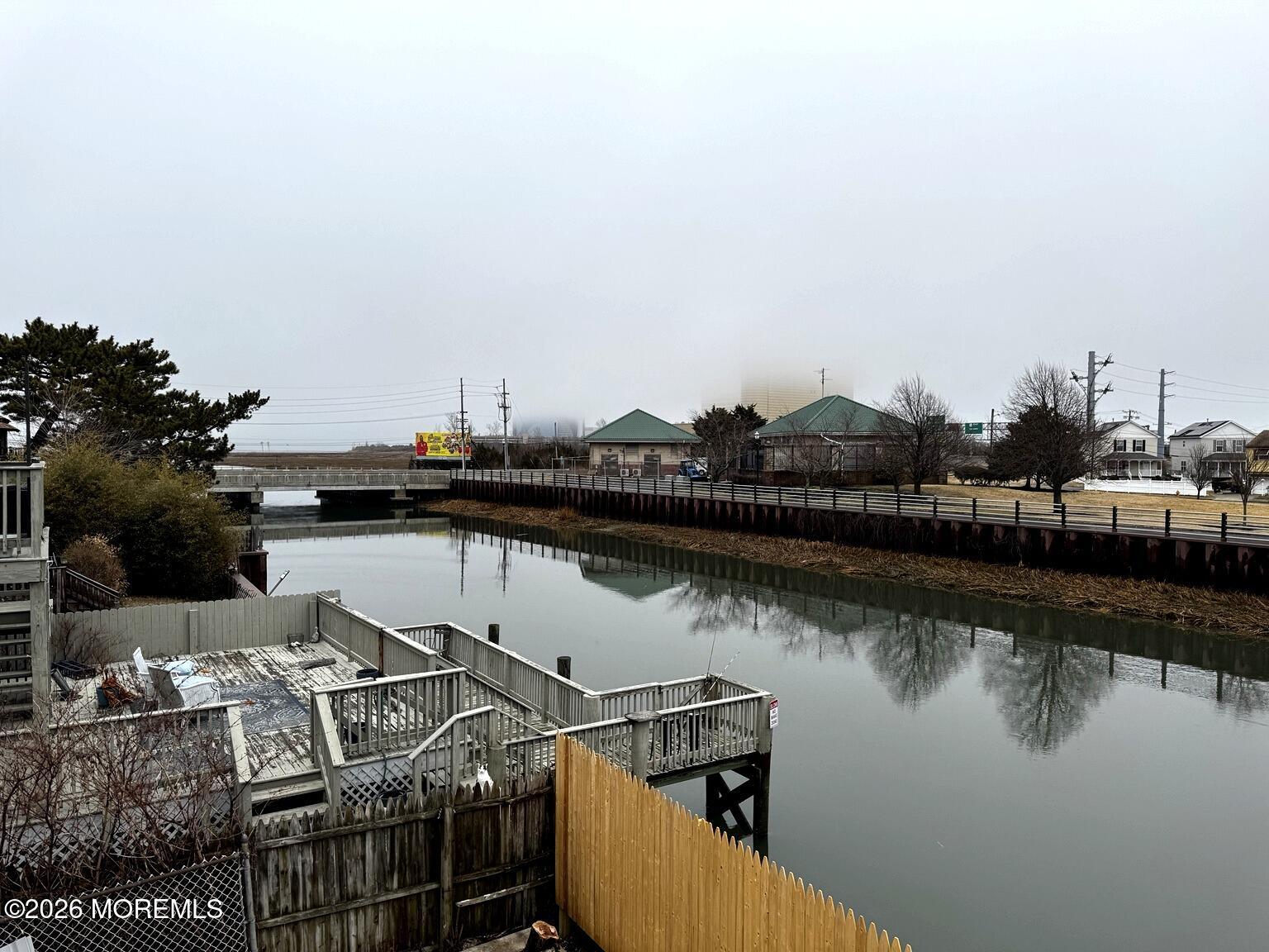 1830 East Riverside Drive Atlantic City, NJ 08401 - Photo 32 of 41 a view of a lake with boats and trees in the background