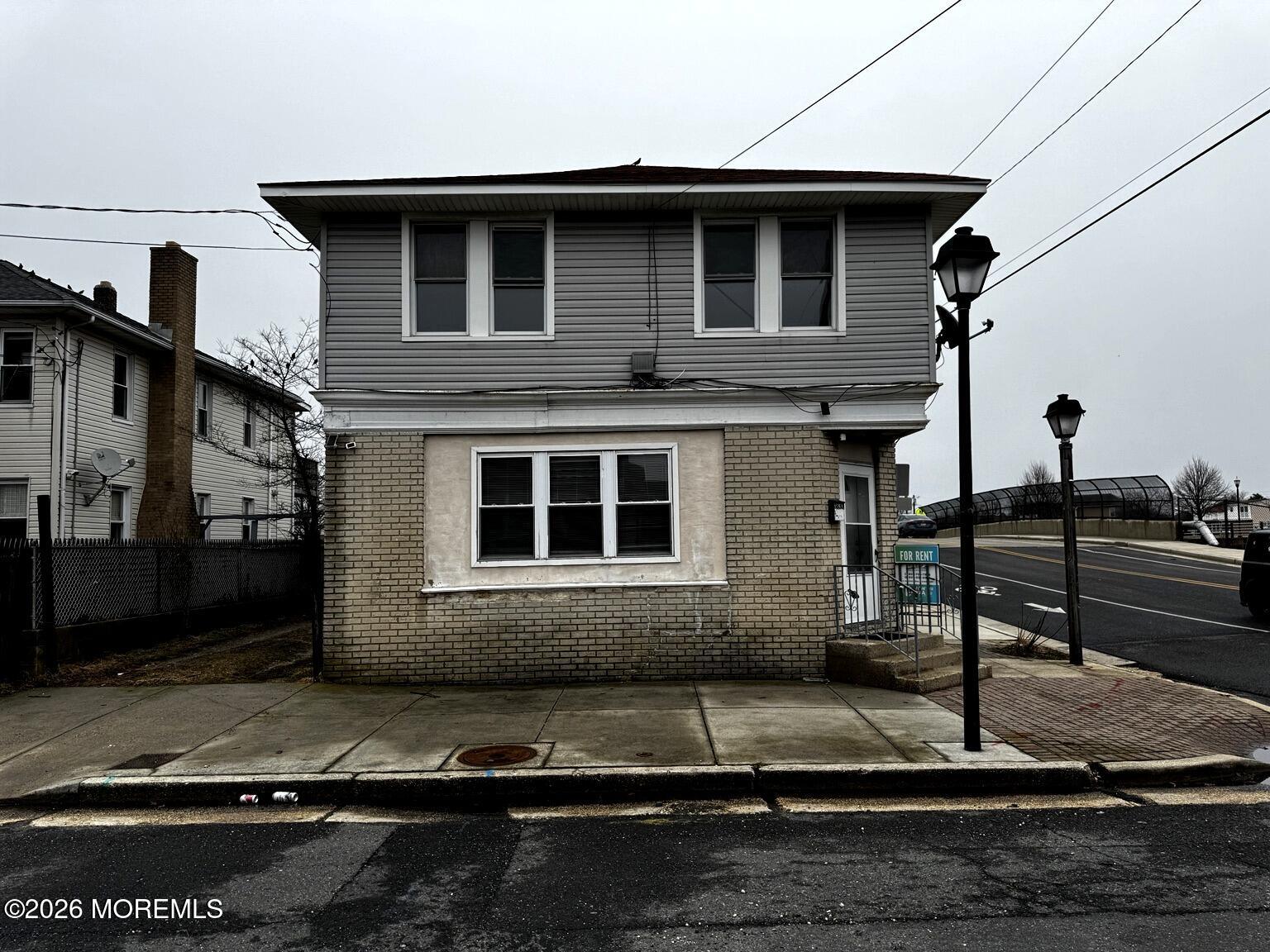 1830 East Riverside Drive Atlantic City, NJ 08401 - Photo 38 of 41 a front view of a house with garage