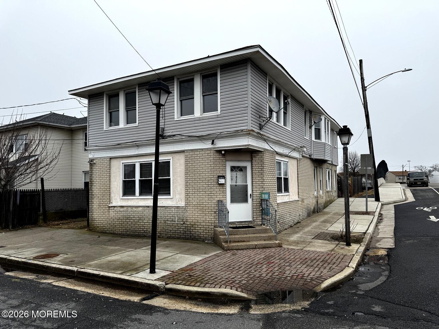 1830 East Riverside Drive Atlantic City, NJ 08401 - Photo 6 of 41 a front view of a house with porch