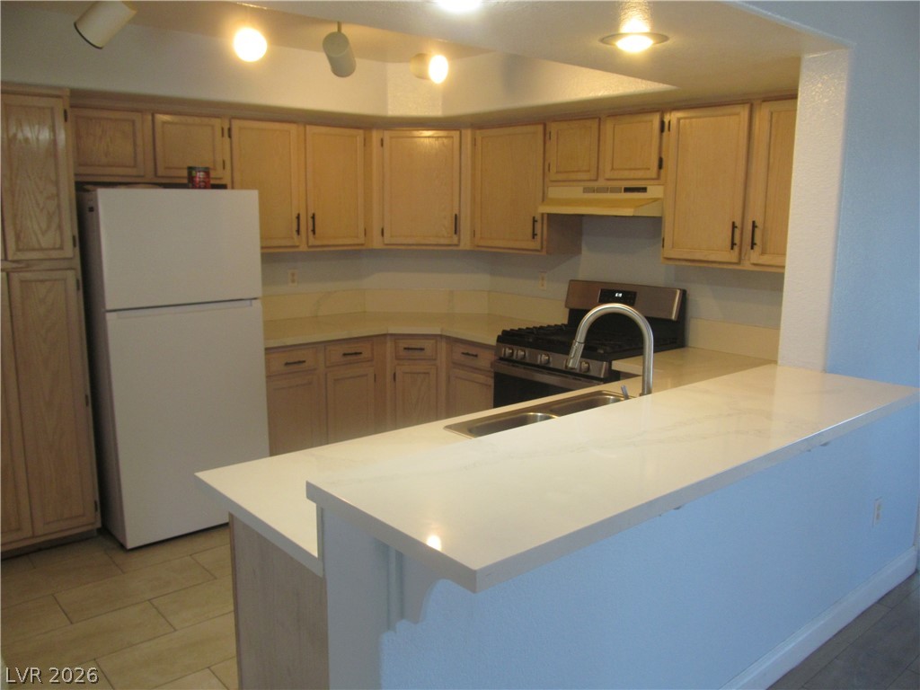 7950 West Flamingo Road, Unit 2048 Las Vegas, NV 89147 - Photo 8 of 24 A well-appointed kitchen offers ample counter space and convenient cooking facilities.