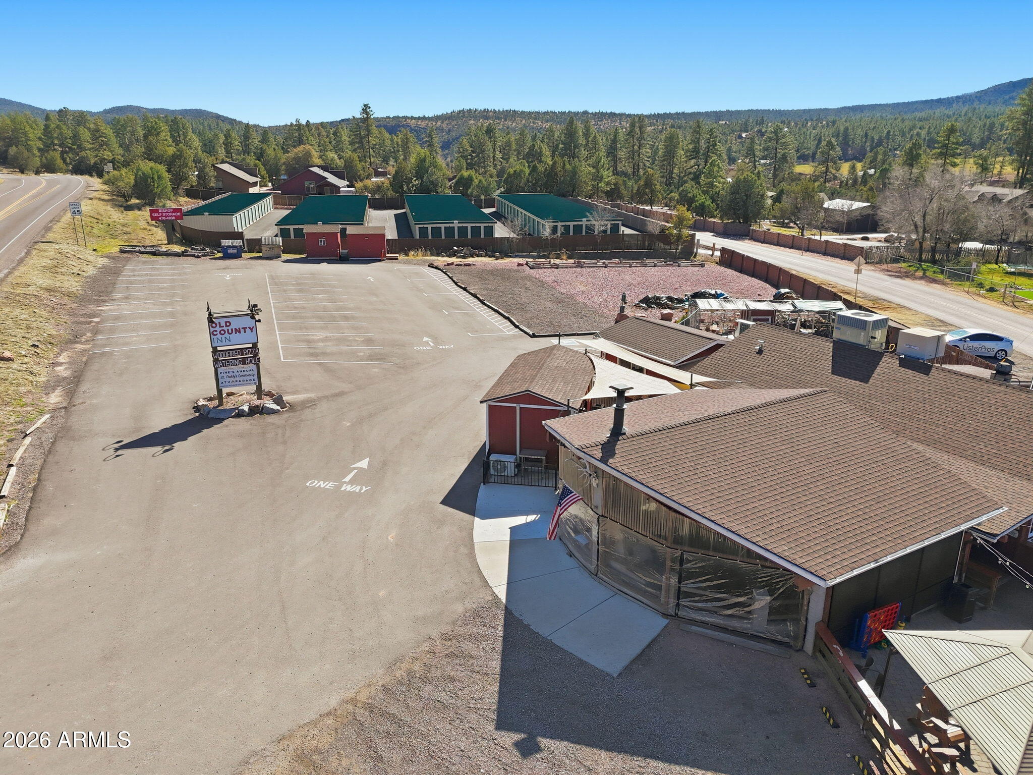8247 Ralls Drive Pine, AZ 85544 - Photo 45 of 50 a view of a terrace with a table and chairs
