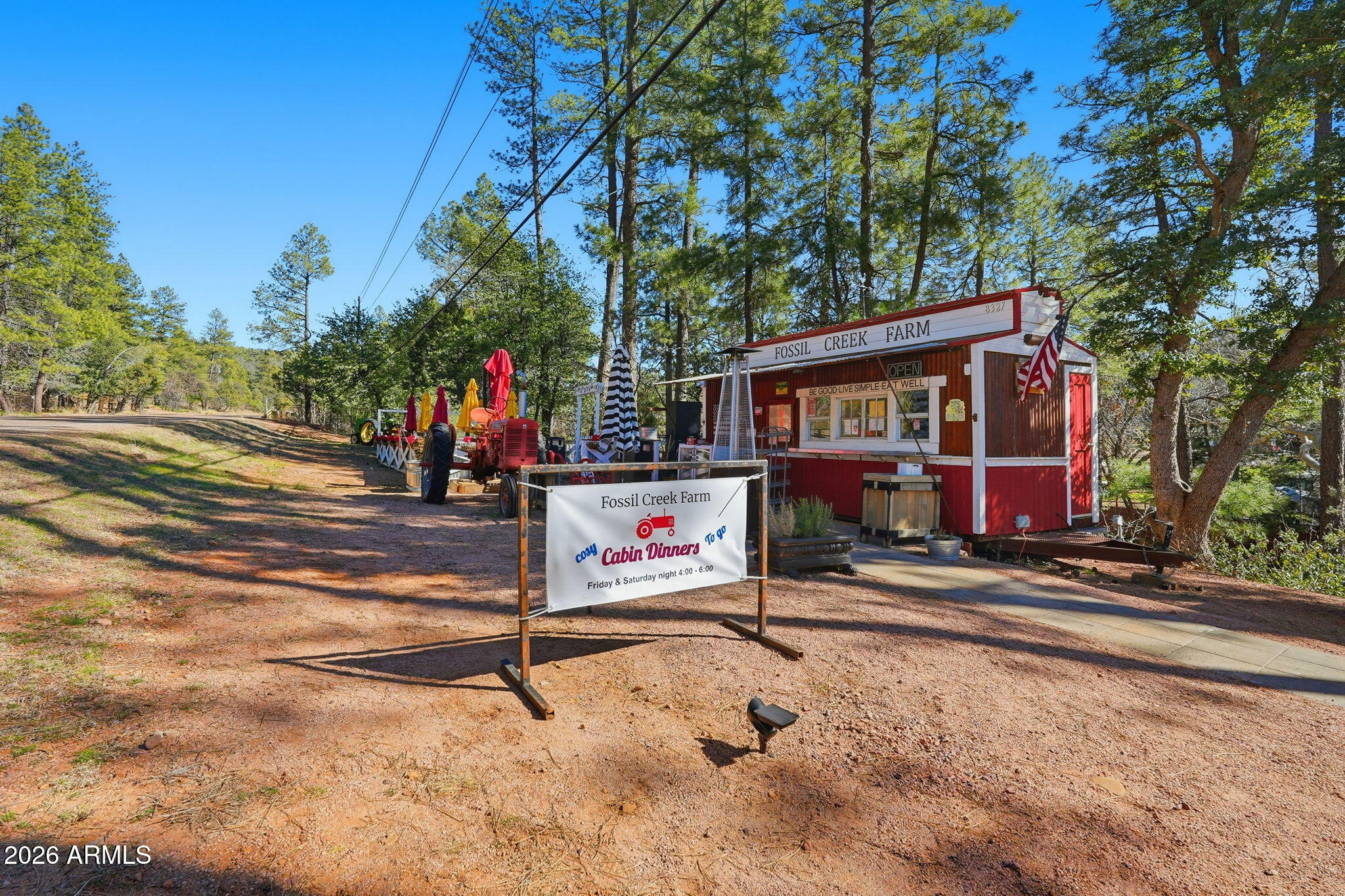 8247 Ralls Drive Pine, AZ 85544 - Photo 47 of 50 front view of a building with a tree