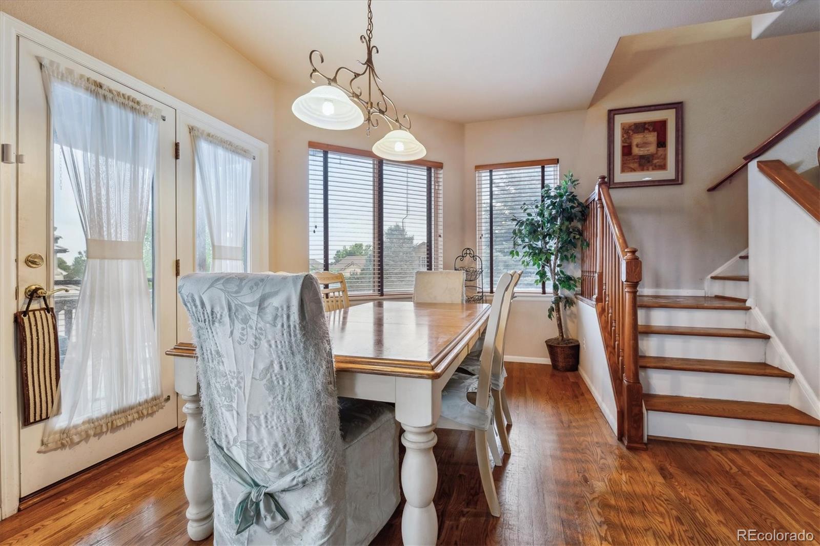 2891 Canyon Crest Drive Highlands Ranch, CO 80126 - Photo 23 of 41 a room with furniture and a large window