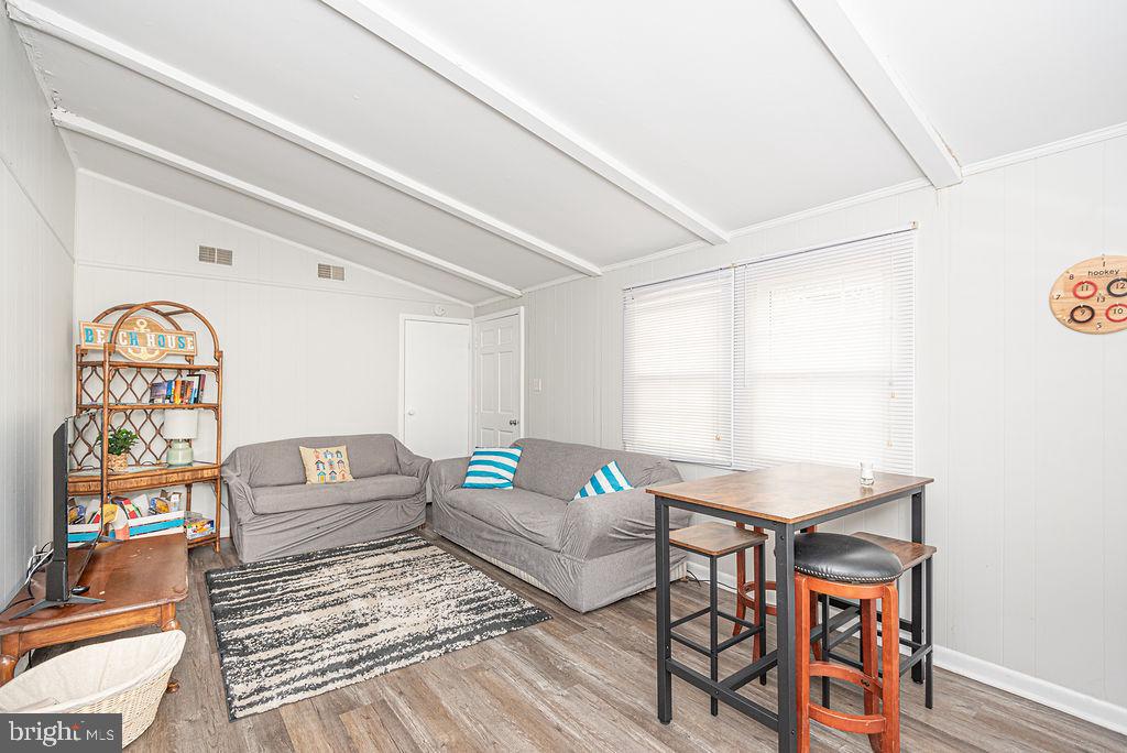 757 Ocean Parkway Ocean Pines, MD 21811 - Photo 13 of 29 a living room with furniture and wooden floor