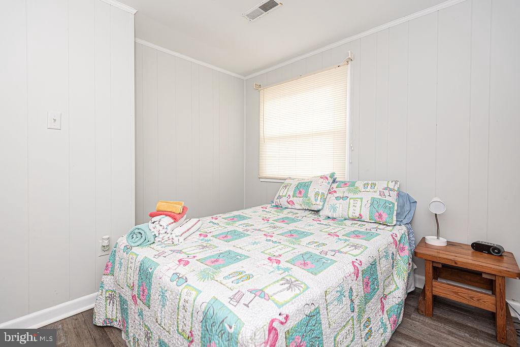 757 Ocean Parkway Ocean Pines, MD 21811 - Photo 20 of 29 a bedroom with a bed and a window