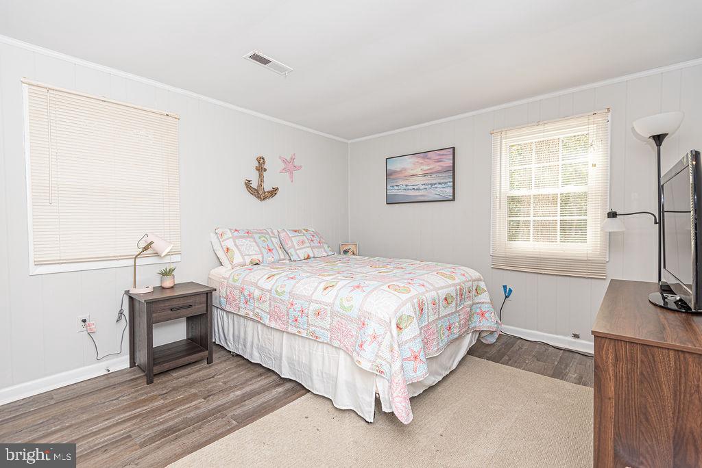 757 Ocean Parkway Ocean Pines, MD 21811 - Photo 28 of 29 a bedroom with a bed and a window