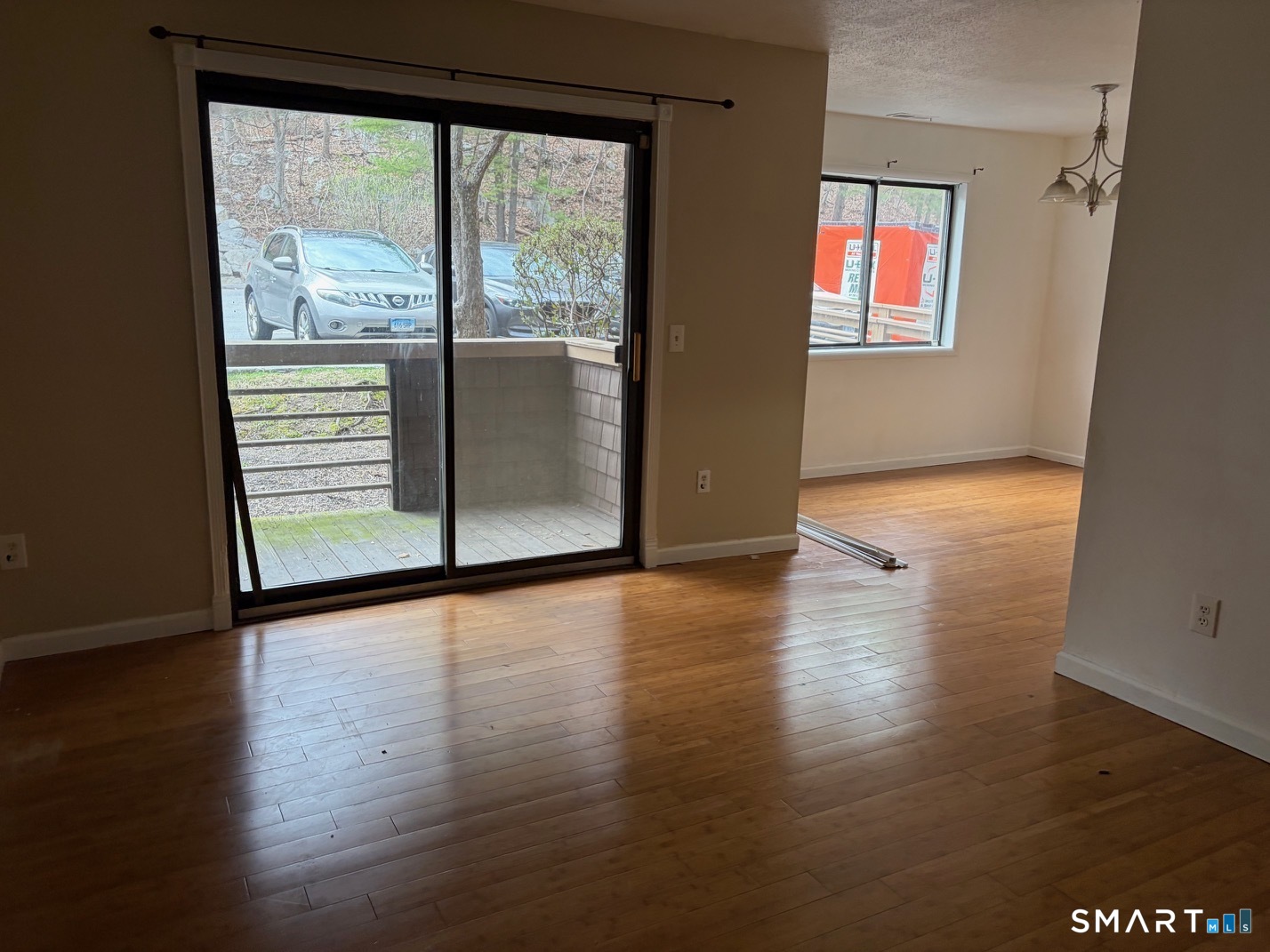 166 Old Brookfield Road, Unit 20B1 Danbury, CT 06811 - Photo 12 of 30 a view of a room with wooden floor and window