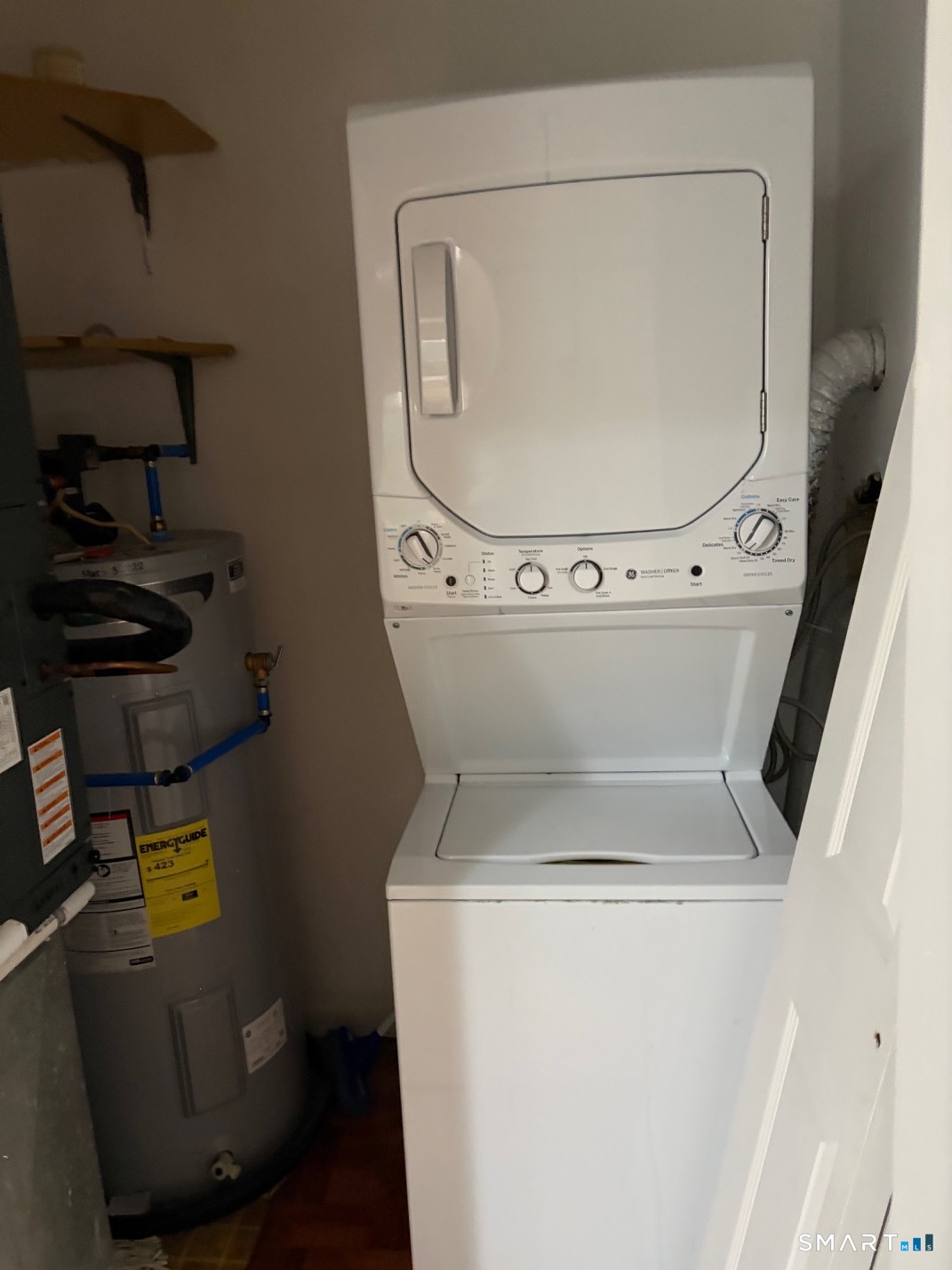 166 Old Brookfield Road, Unit 20B1 Danbury, CT 06811 - Photo 14 of 30 a utility room with dryer and washer