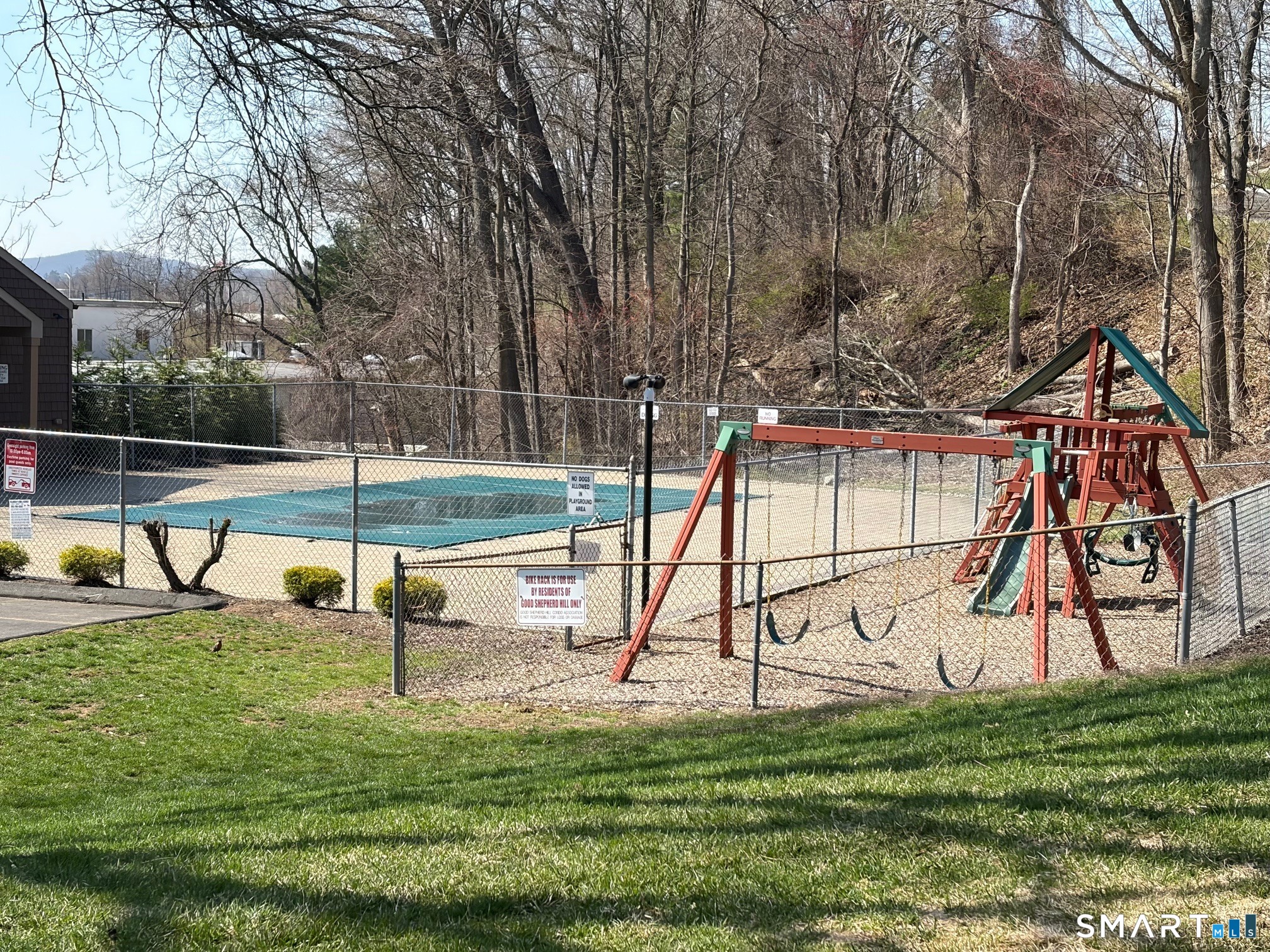 166 Old Brookfield Road, Unit 20B1 Danbury, CT 06811 - Photo 2 of 30 a view of park with swings