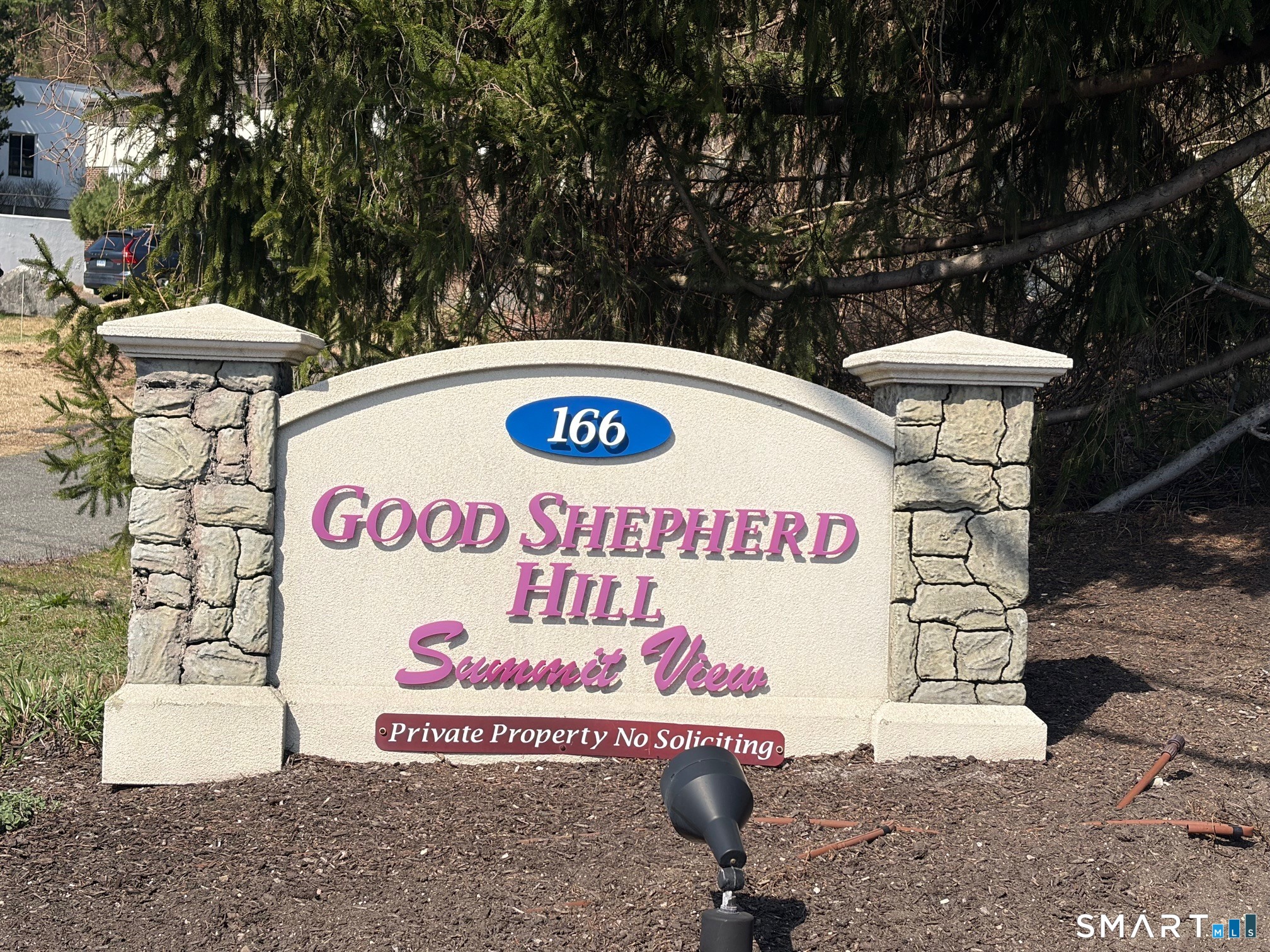 166 Old Brookfield Road, Unit 20B1 Danbury, CT 06811 - Photo 3 of 30 a sign that is on the wall