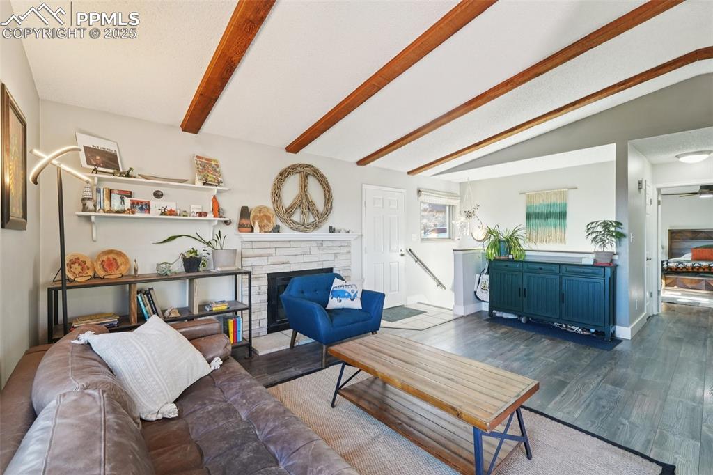 975 Crystal Park Road Manitou Springs, CO 80829 - Photo 4 of 38 a living room with furniture and wooden floor