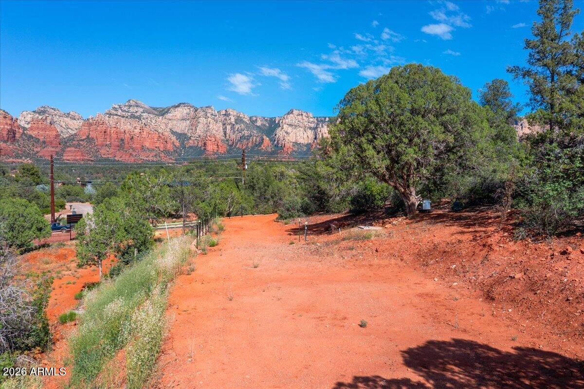 1204 Az-179 Sedona, AZ 86336 - Photo 11 of 12 a view of a yard in front of house