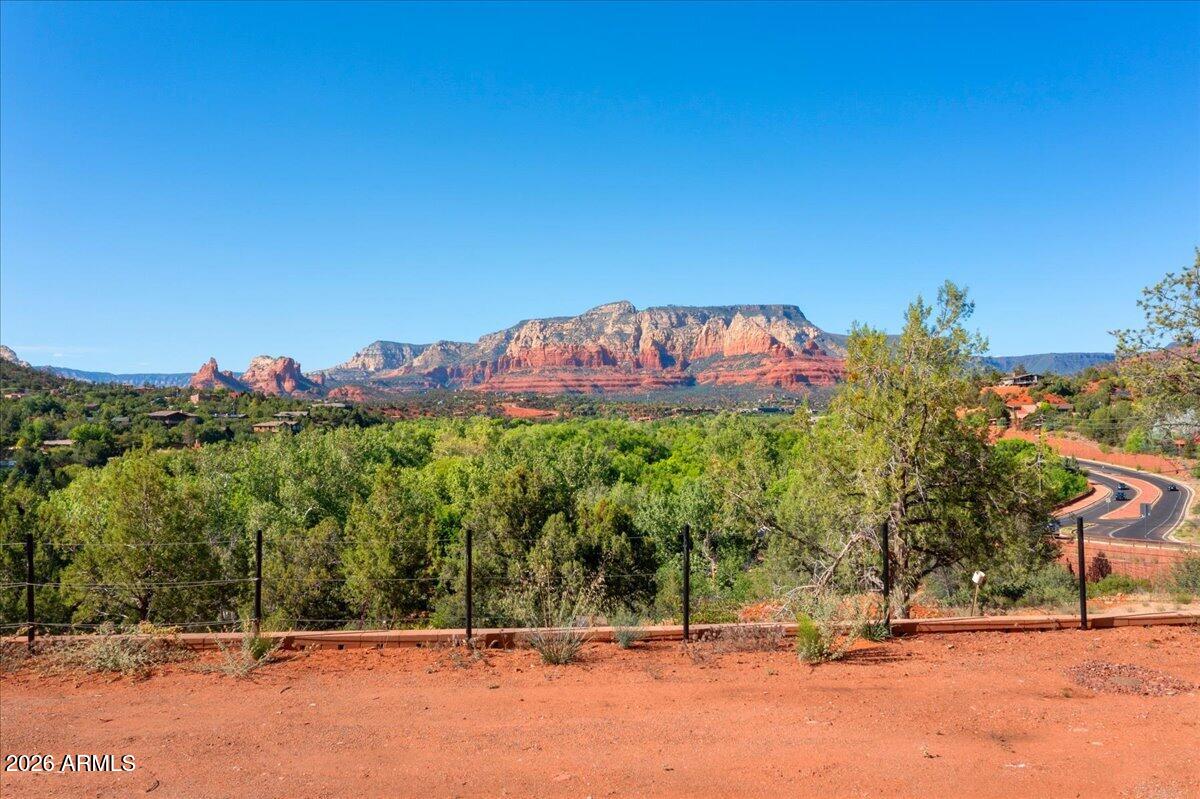 1204 Az-179 Sedona, AZ 86336 - Photo 2 of 12 a view of a house with a yard