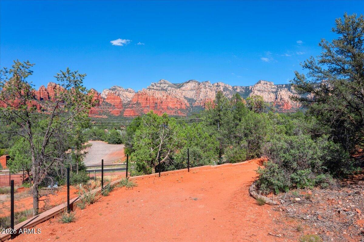 1204 Az-179 Sedona, AZ 86336 - Photo 7 of 12 a view of a yard in front of house