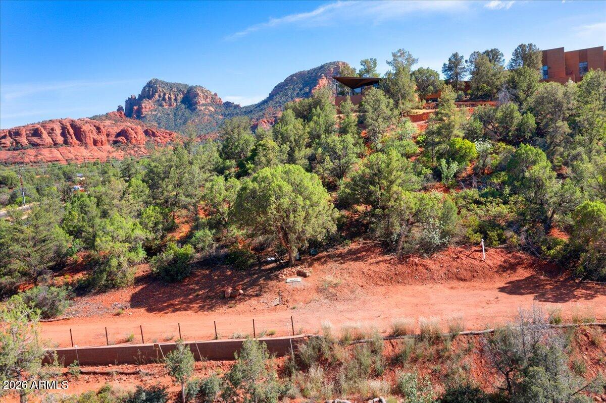 1204 Az-179 Sedona, AZ 86336 - Photo 9 of 12 a view of a houses with a yard