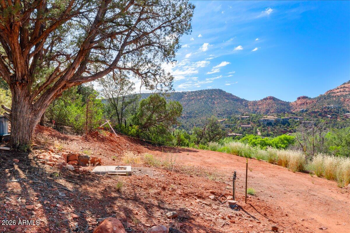 1204 Az-179 Sedona, AZ 86336 - Photo 10 of 12 a view of a road with a yard