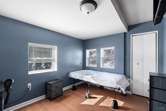 a kitchen with stainless steel appliances granite countertop a refrigerator and a stove