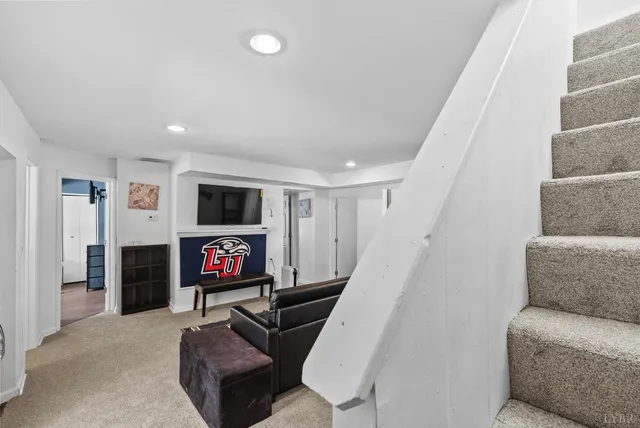 a view of walk in closet with clothes